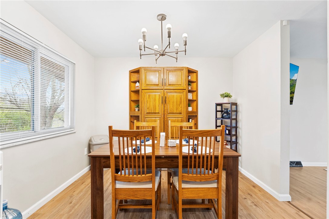 8180 Manning Road Germantown, OH 45327 - Photo 13 of 39 This bright dining area features an elegant light fixture and ample natural light.