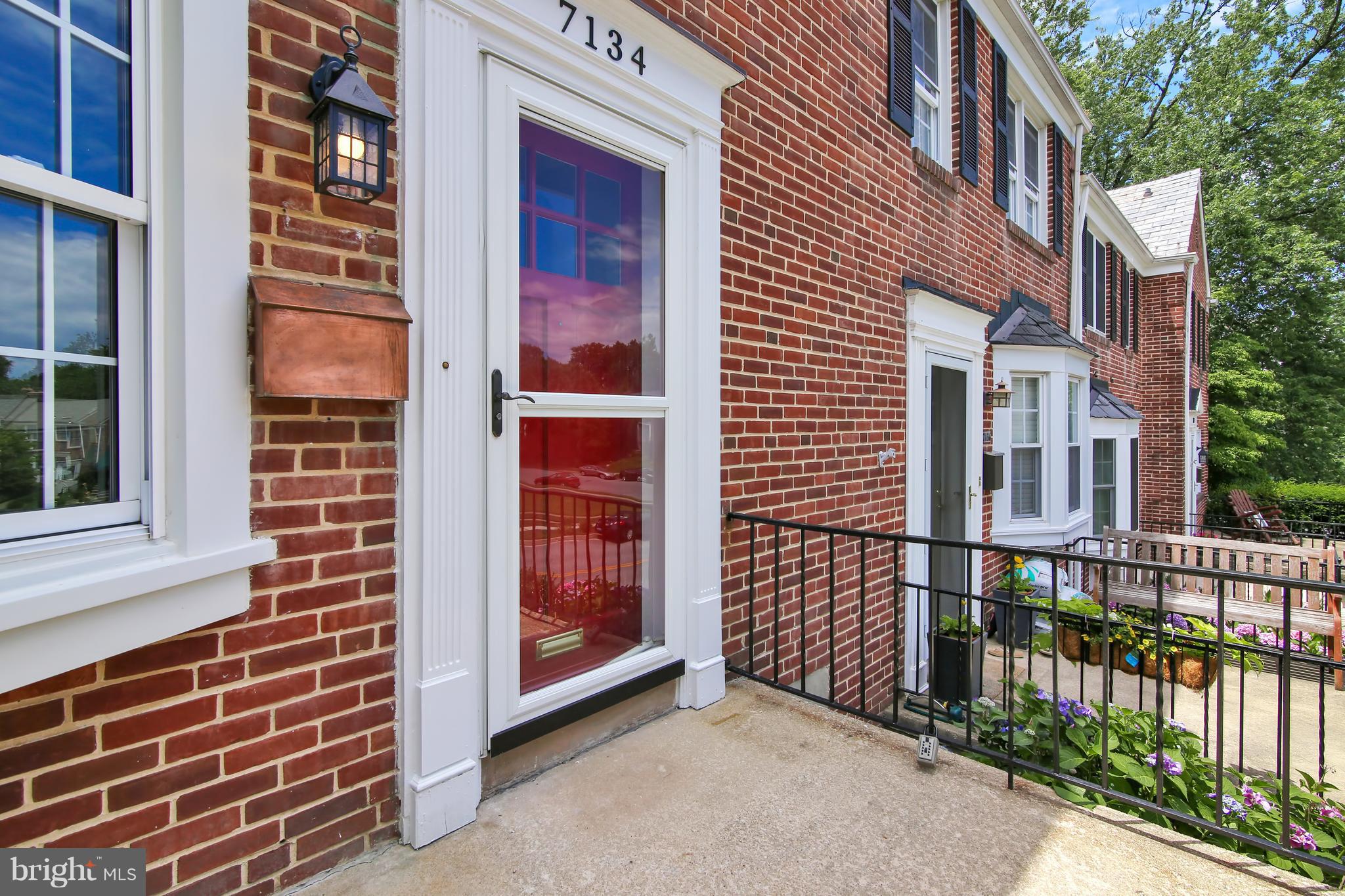 7134 Heathfield Road Baltimore, MD 21212 - Photo 3 of 28 a view of a brick house with many windows