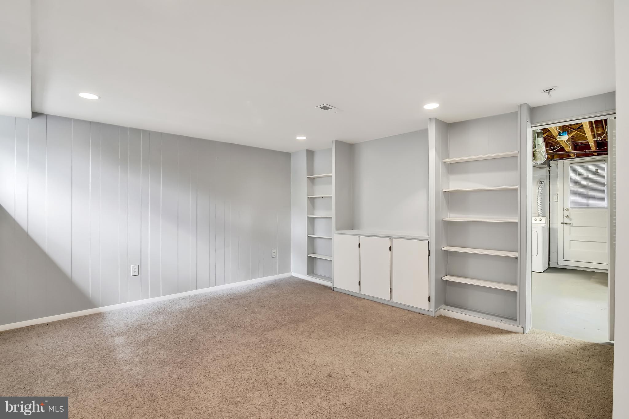 7134 Heathfield Road Baltimore, MD 21212 - Photo 22 of 28 a view of an empty room with a window