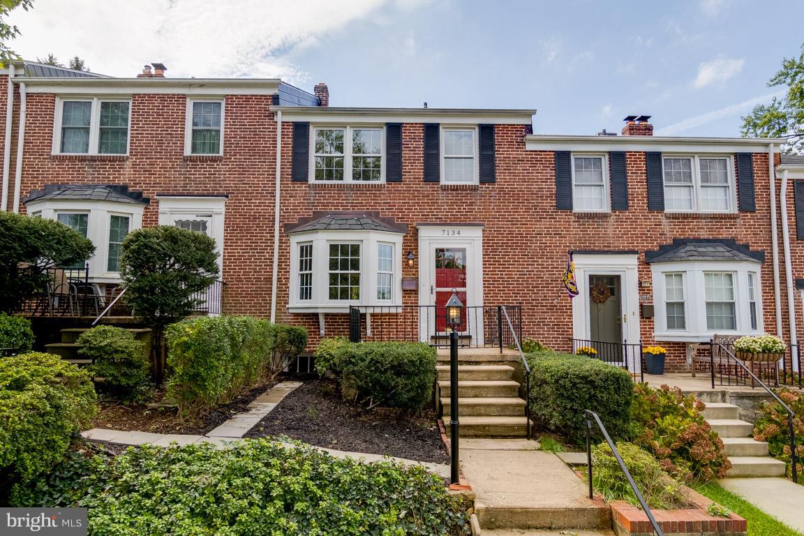 7134 Heathfield Road Baltimore, MD 21212 - Photo 27 of 28 a front view of a house with a yard