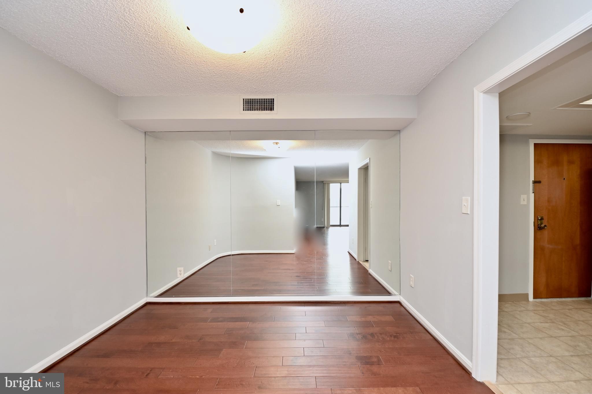 1101 South Arlington Ridge Road, Unit 509 Arlington, VA 22202 - Photo 17 of 62 a view of livingroom with wooden floor