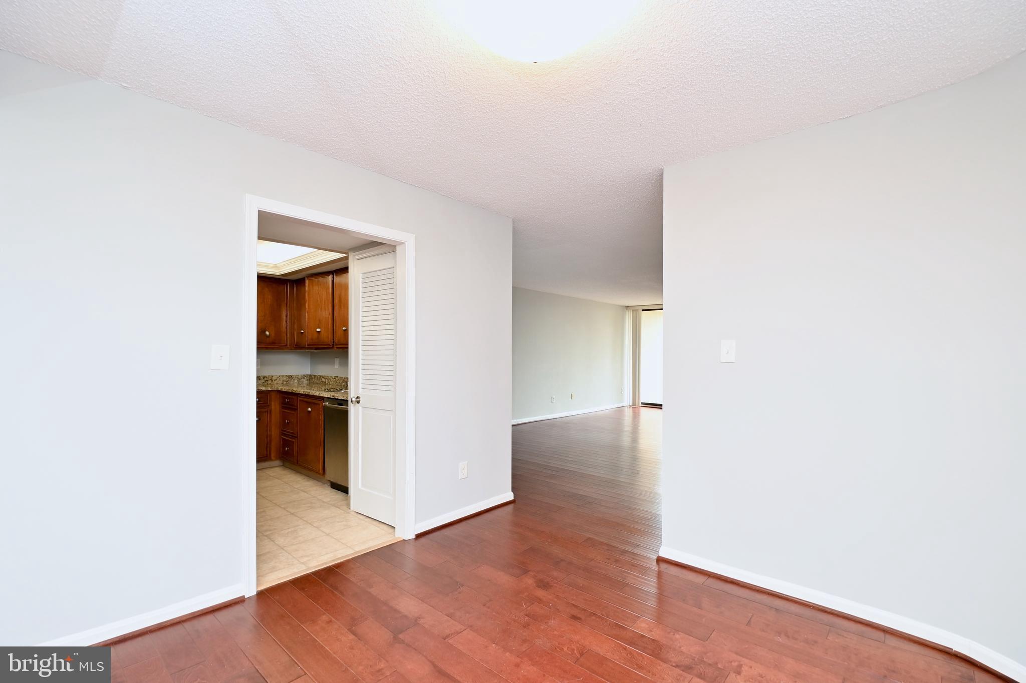 1101 South Arlington Ridge Road, Unit 509 Arlington, VA 22202 - Photo 18 of 62 a view of a hallway with wooden floor