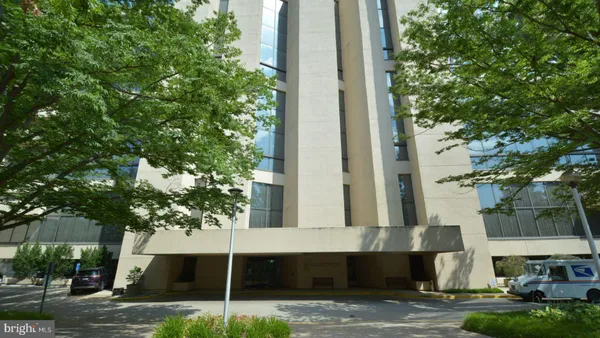 a front view of a building with street view