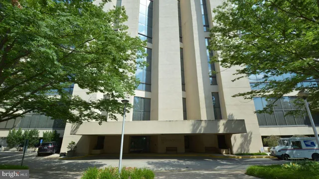a front view of a building with street view