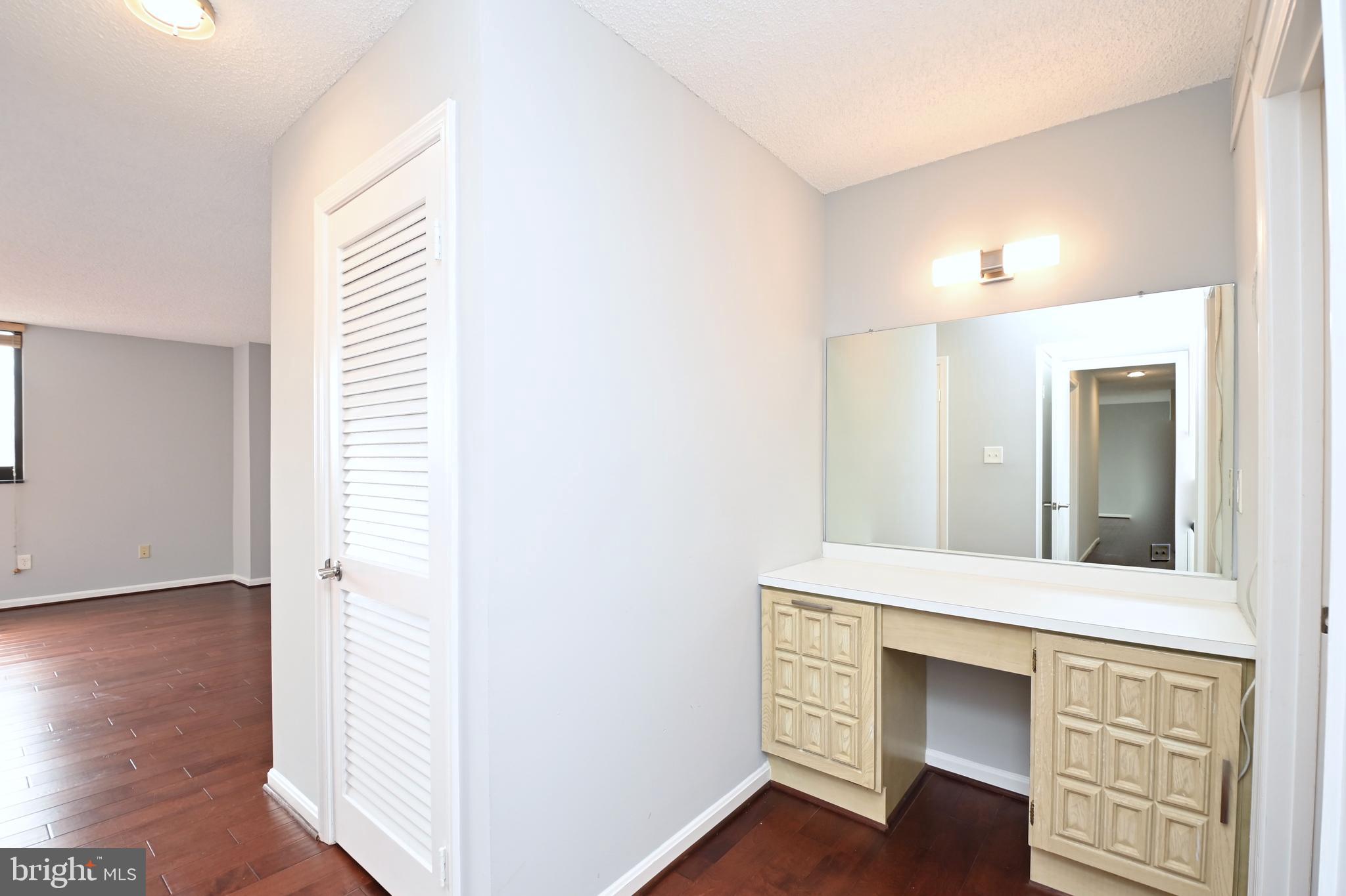 1101 South Arlington Ridge Road, Unit 509 Arlington, VA 22202 - Photo 35 of 62 a view of an empty room and wooden floor