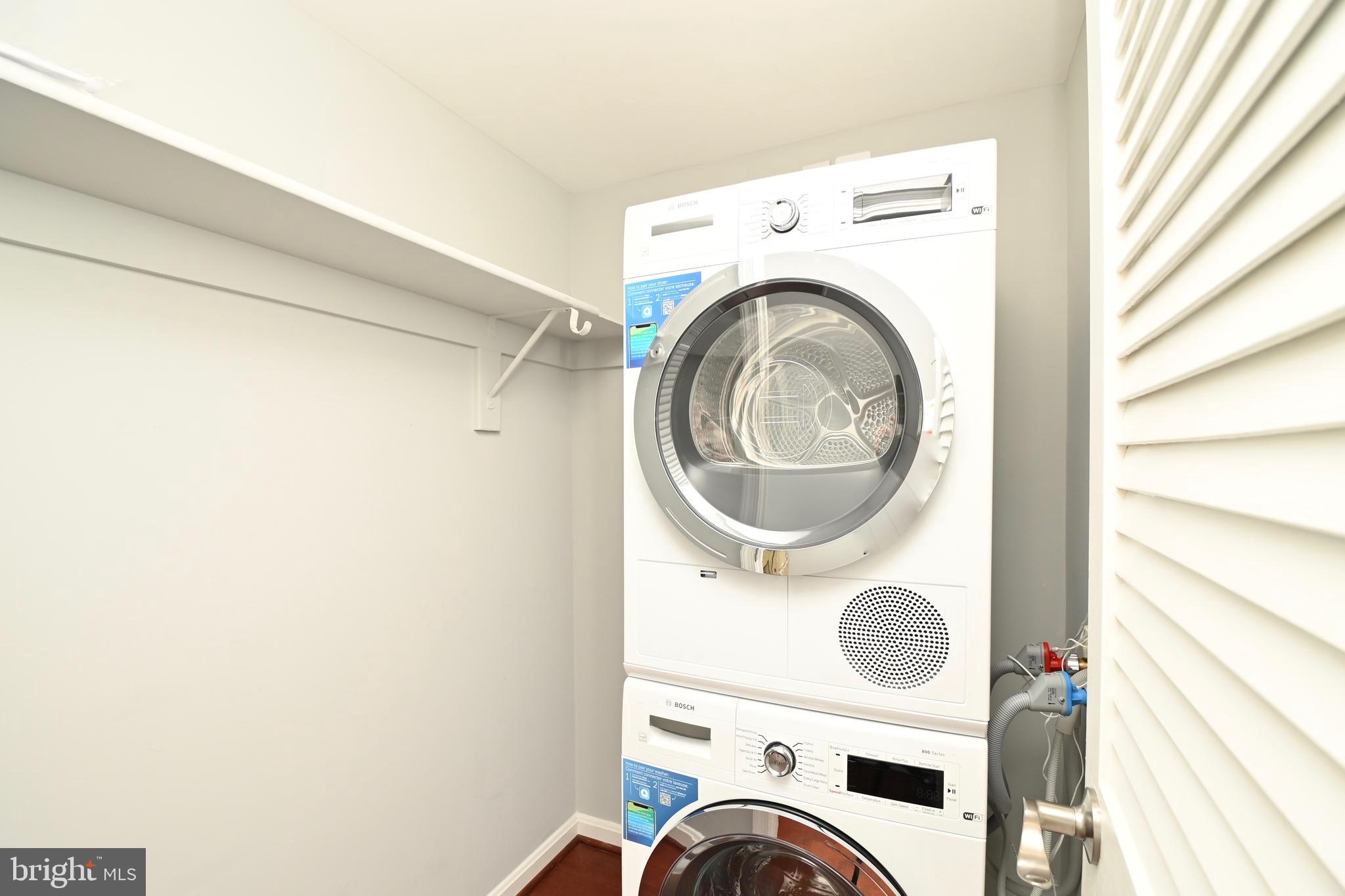 1101 South Arlington Ridge Road, Unit 509 Arlington, VA 22202 - Photo 38 of 62 a utility room with dryer and washer