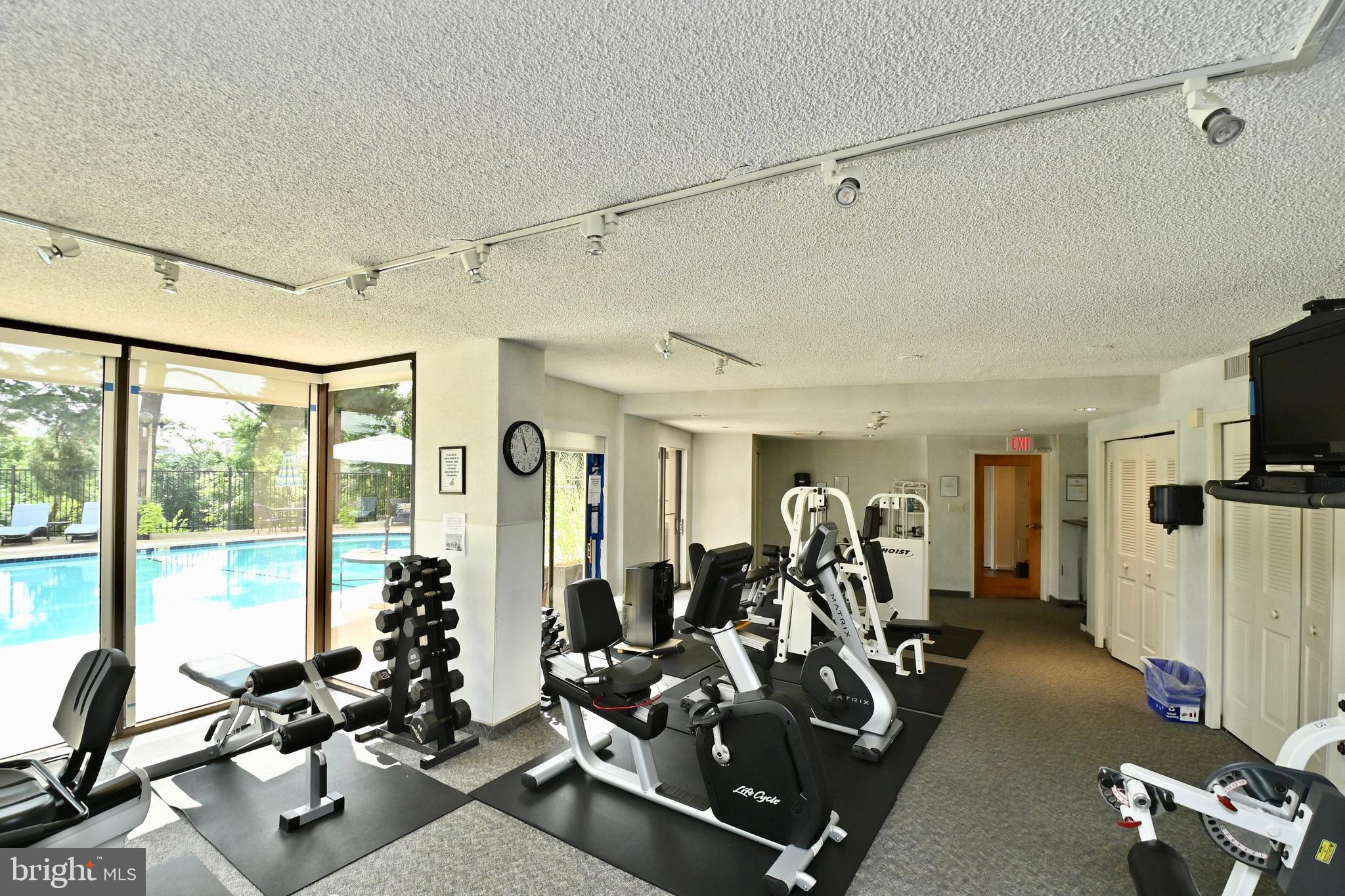 1101 South Arlington Ridge Road, Unit 509 Arlington, VA 22202 - Photo 49 of 62 a view of a room with gym equipment