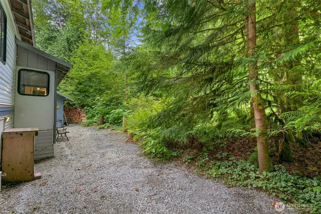 a backyard of a house with lots of green space