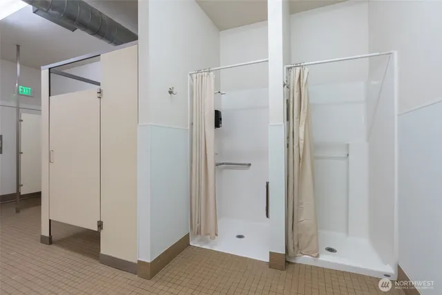 a view of a livingroom with furniture and a flat screen tv