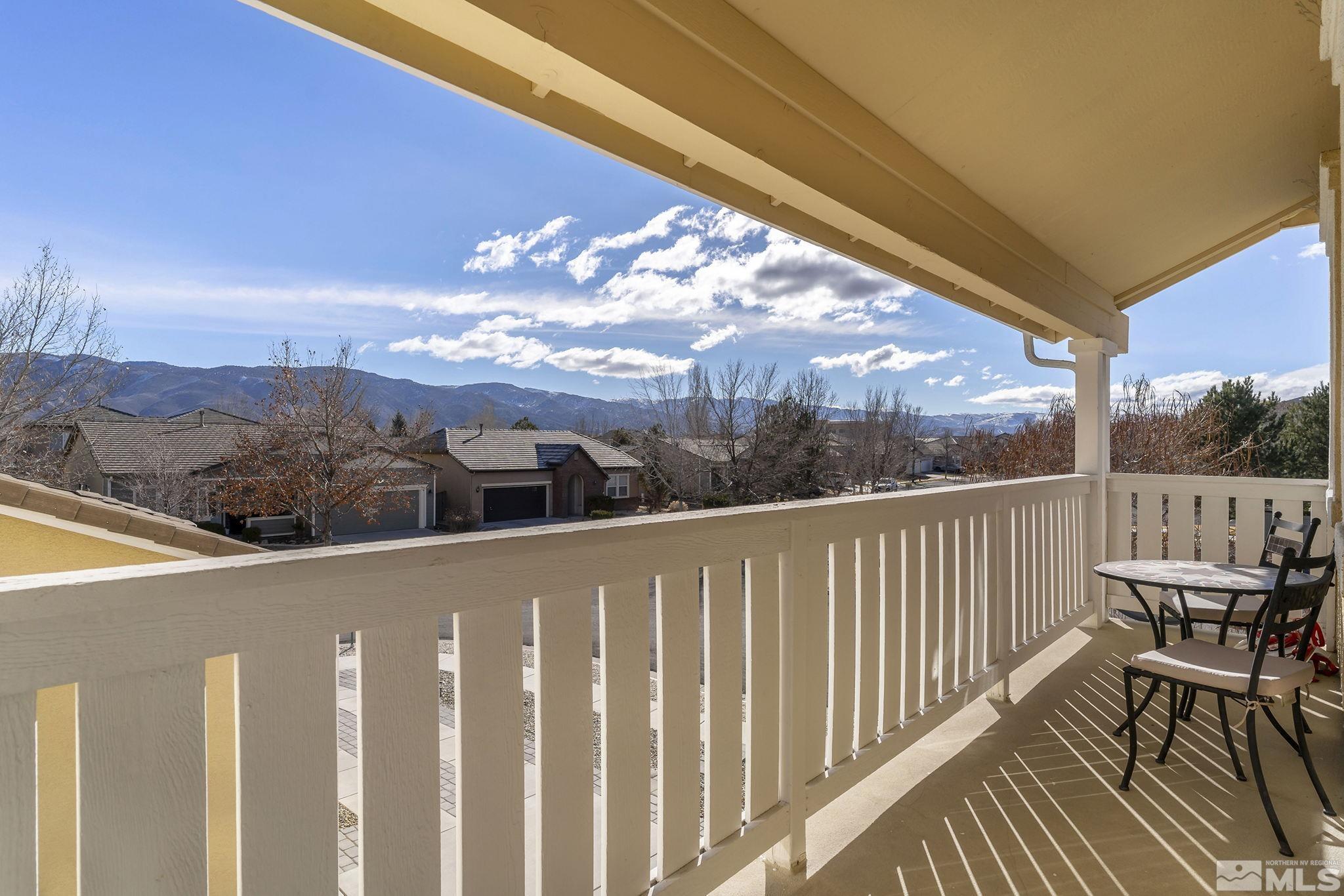 10525 Yuba Court Reno, NV 89521 - Photo 1 of 13 a view of a chairs on the roof deck
