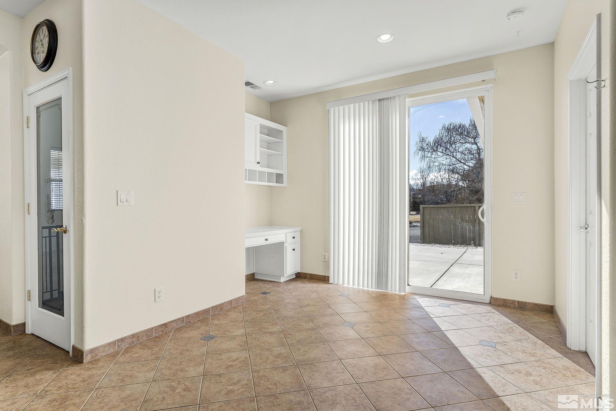 10525 Yuba Court Reno, NV 89521 - Photo 8 of 13 a view of a room with wooden floor and bathroom