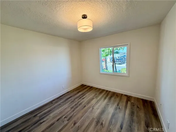 a bathroom with a double vanity sink mirror and toilet