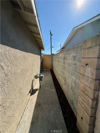 a view of a backyard of the house