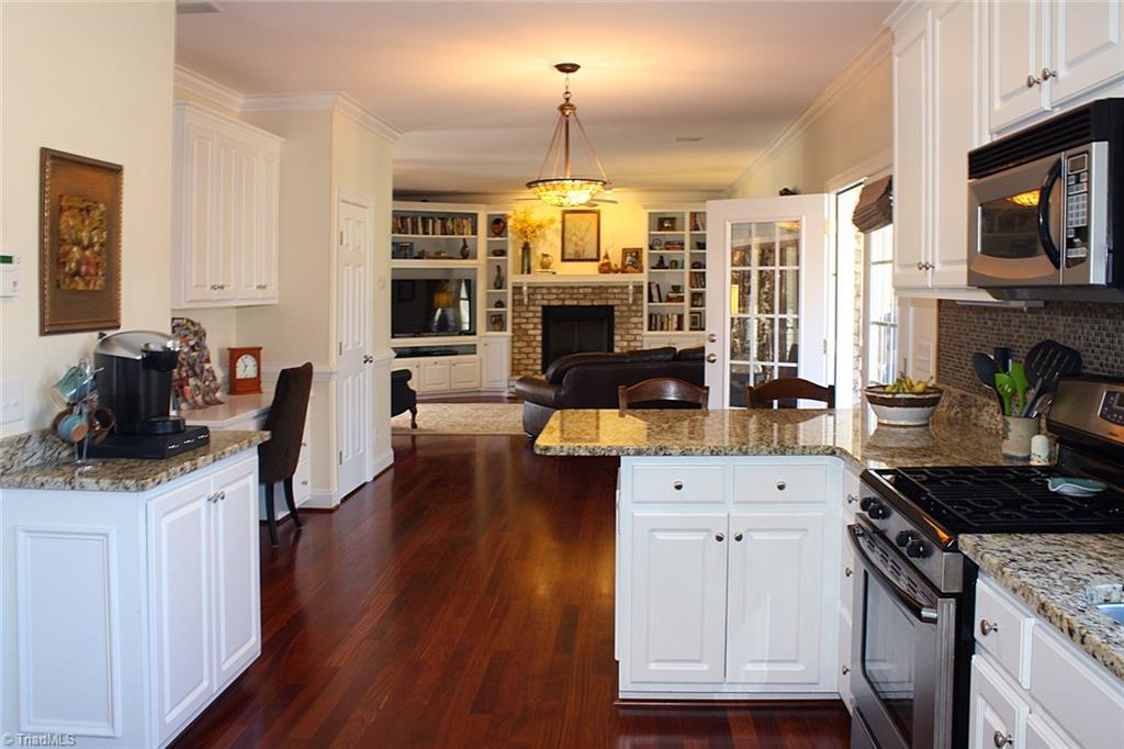 3743 Hub Mill Road Elon, NC 27244 - Photo 13 of 28 kitchen looking to family room