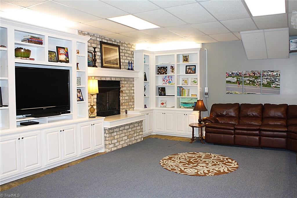3743 Hub Mill Road Elon, NC 27244 - Photo 26 of 28 family room section of basement