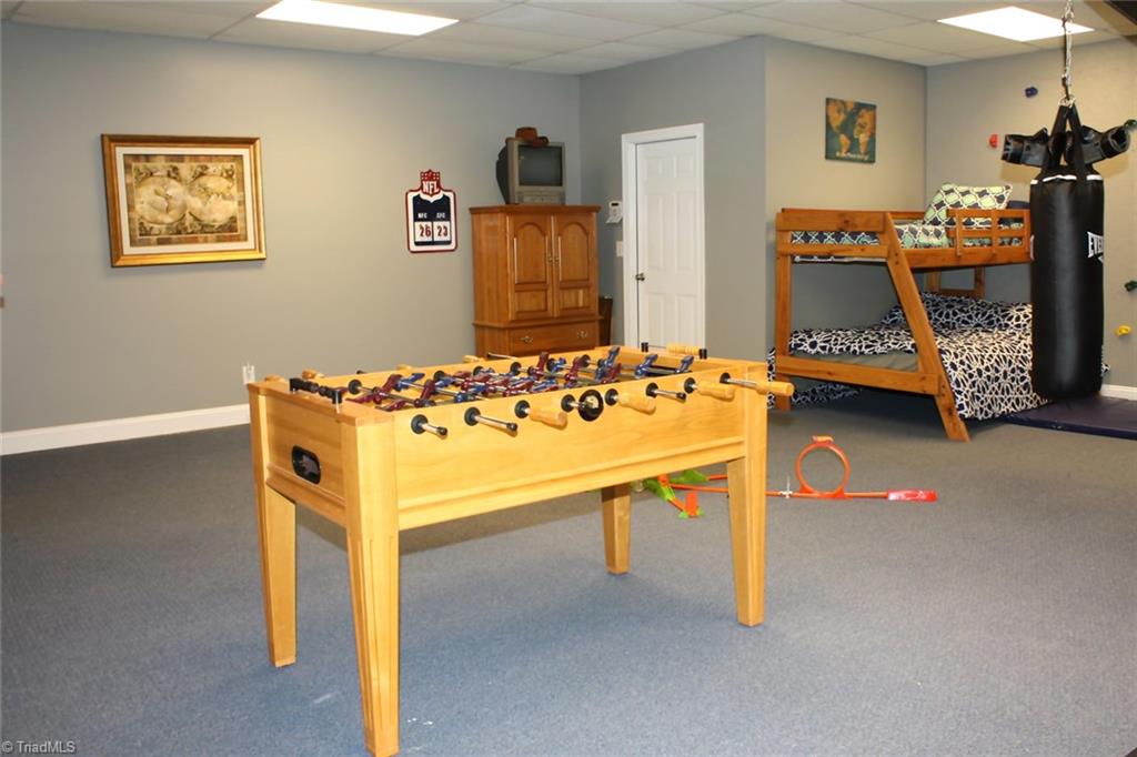3743 Hub Mill Road Elon, NC 27244 - Photo 27 of 28 game room section of basement