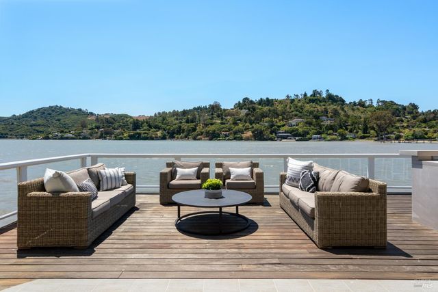 a view of sitting area with furniture and outdoor seating