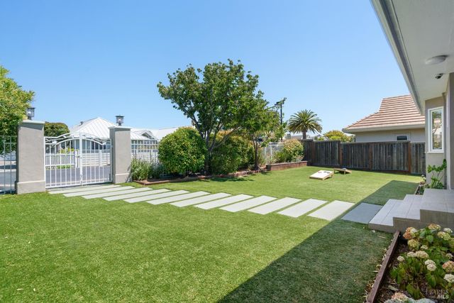 a view of a backyard with a garden