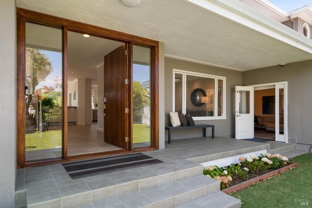 a outdoor space view with a garden and couches in the patio