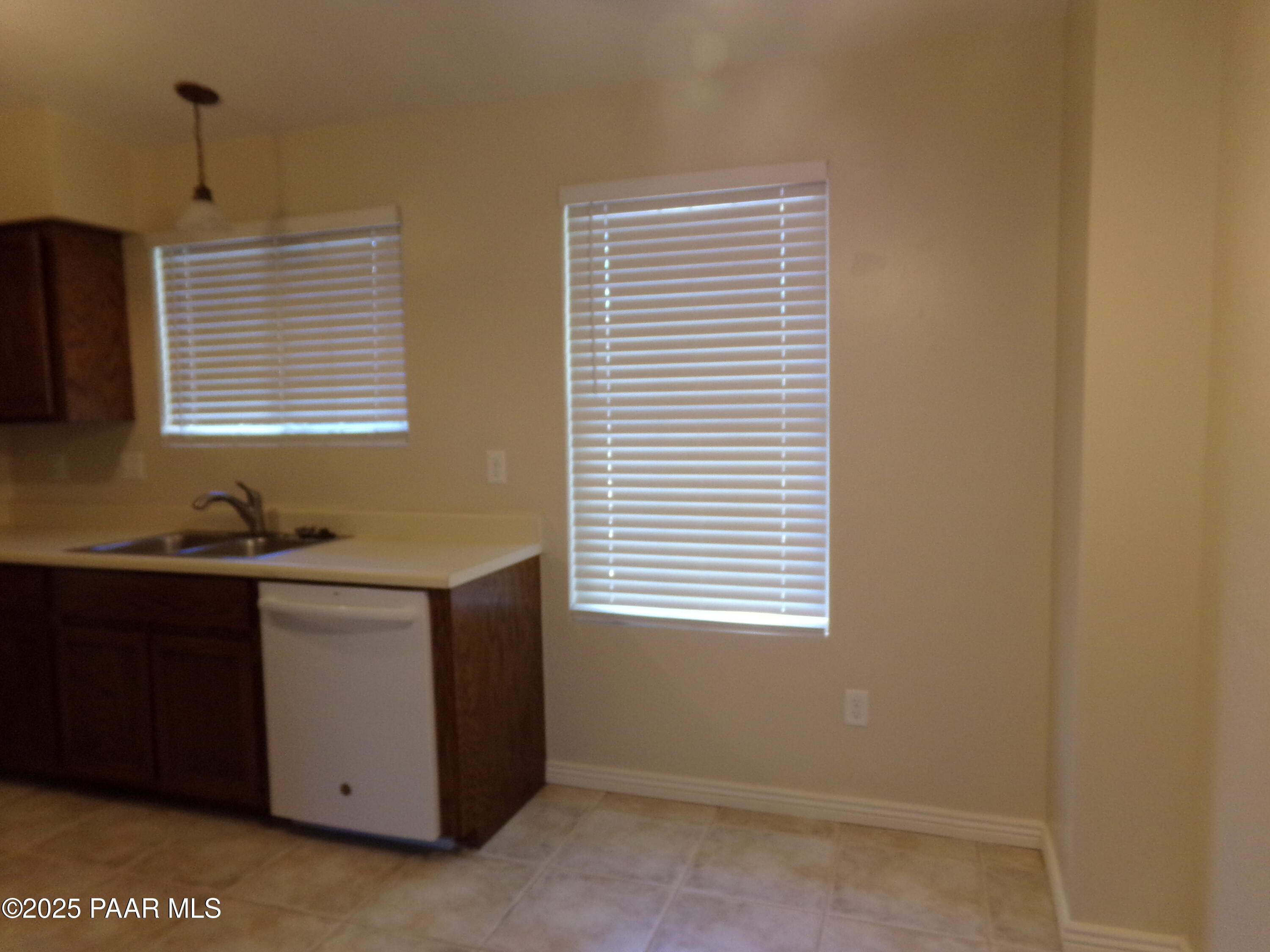 345 South Virginia Street, Unit 1 Prescott, AZ 86303 - Photo 3 of 13 a kitchen that has a sink and a window in it