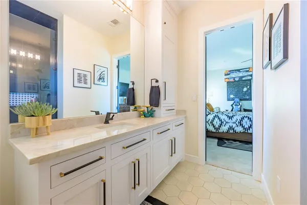a kitchen with a sink and cabinets