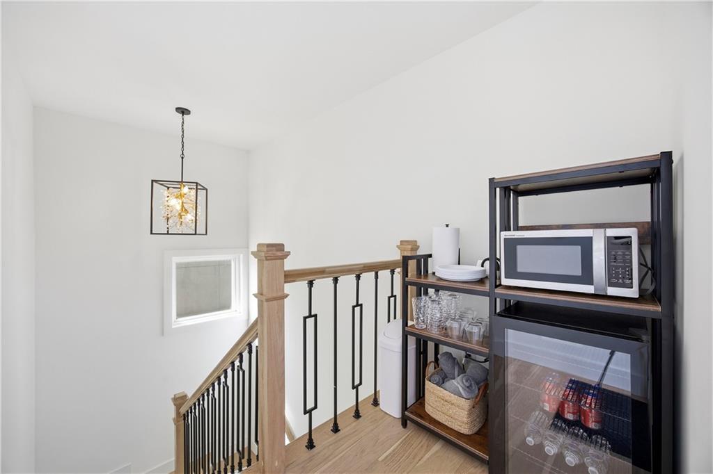 Undisclosed Address Atlanta, GA 30313 - Photo 23 of 35 a view of a livingroom with furniture and stairs