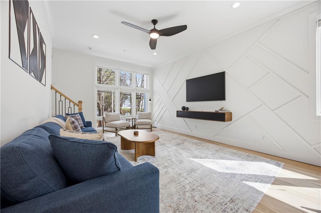 Undisclosed Address Atlanta, GA 30313 - Photo 29 of 35 a living room with furniture and a flat screen tv