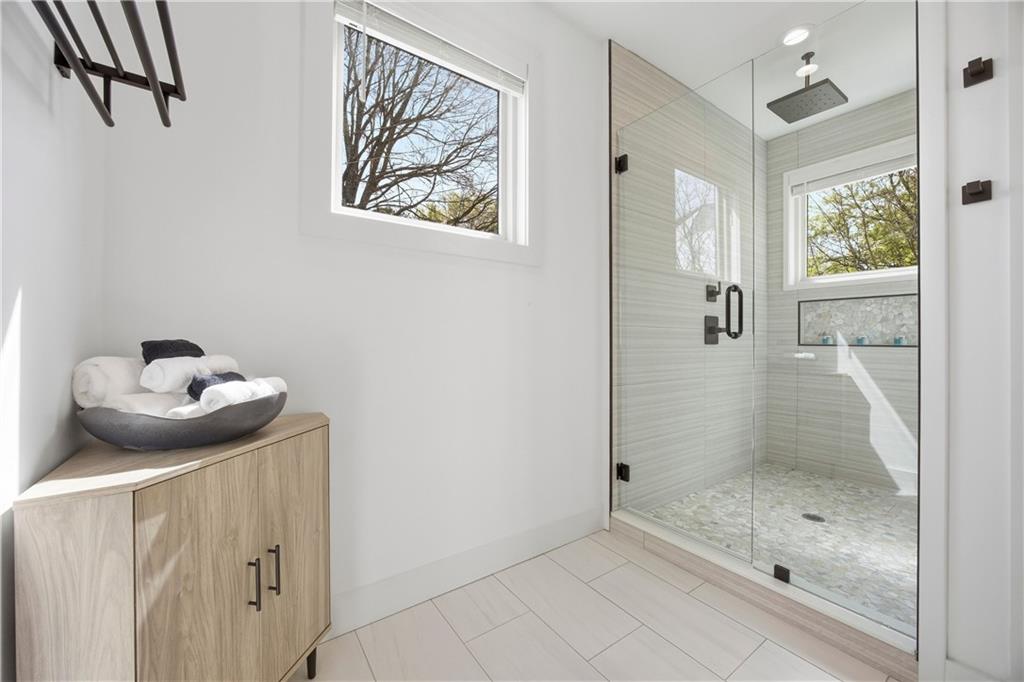 Undisclosed Address Atlanta, GA 30313 - Photo 33 of 35 a bathroom with a shower and sink