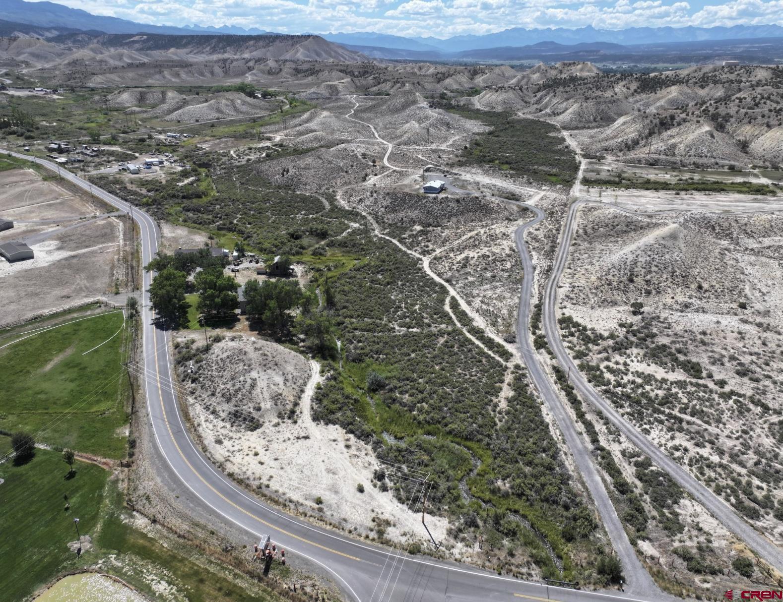 68504 Kinikin Road Montrose, CO 81403 - Photo 2 of 2 a view of a forest with a forest