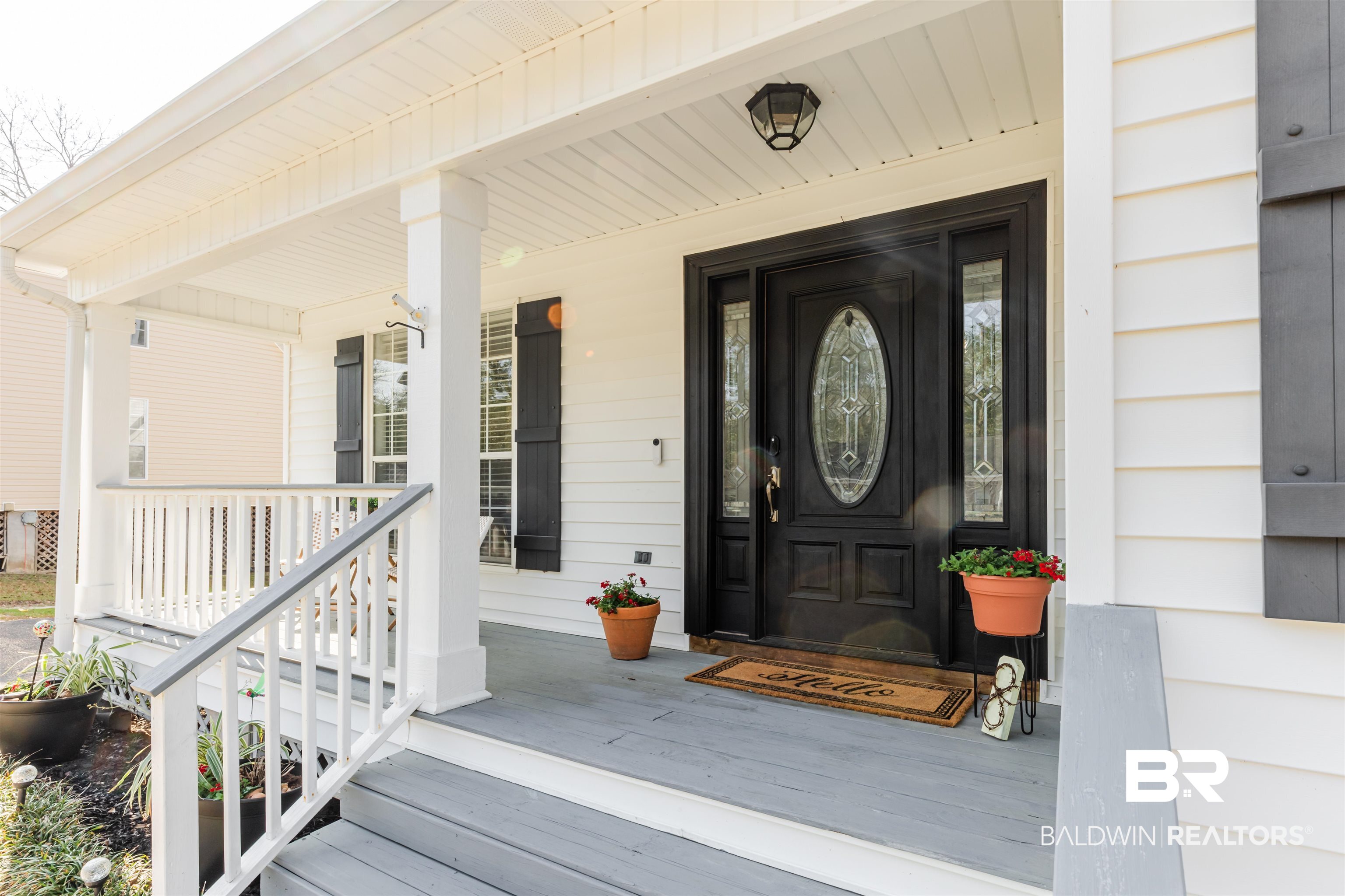 3844 Isabel Way South Mobile, AL 36693 - Photo 4 of 49 Entrance to property featuring a porch
