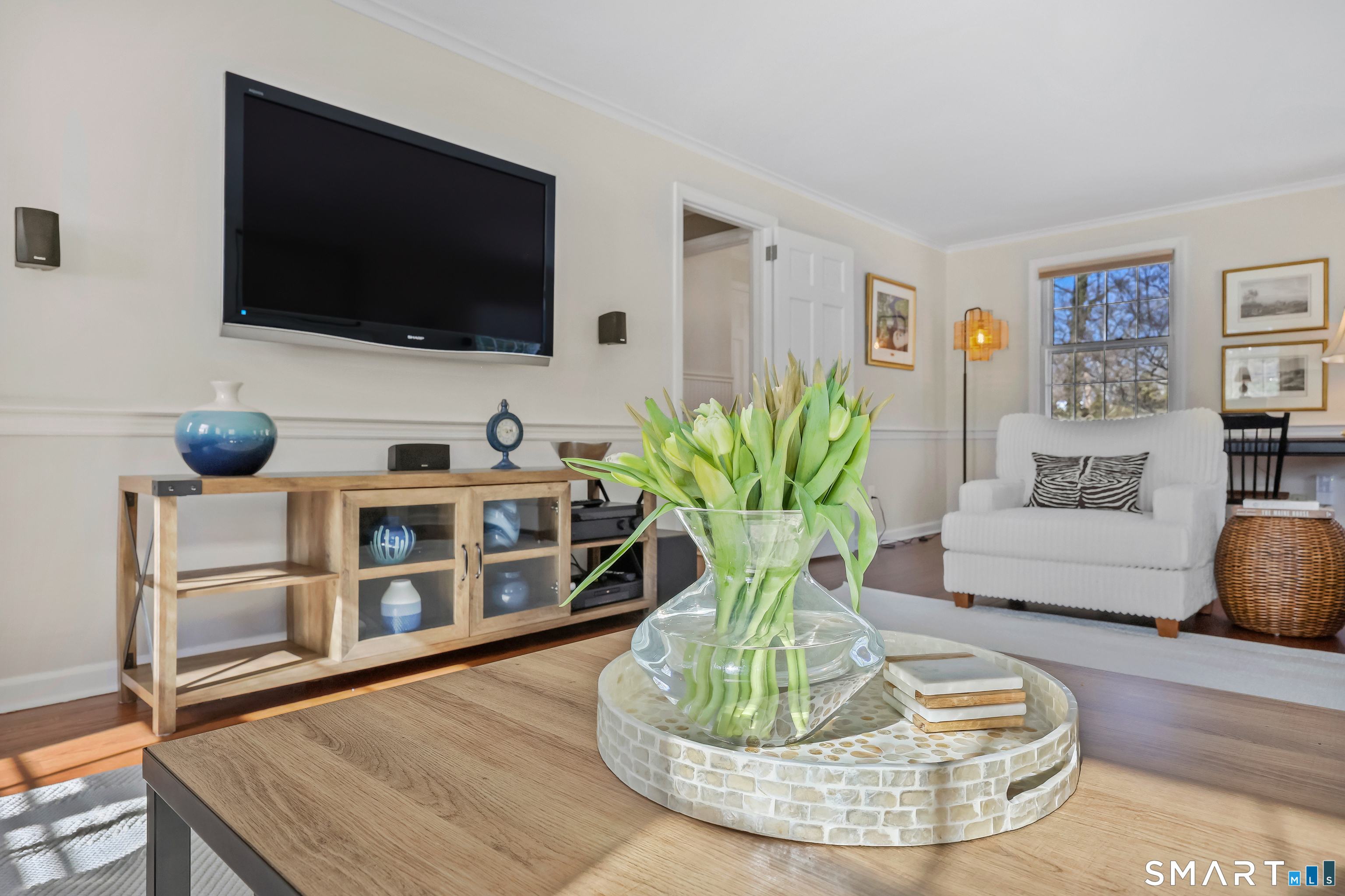 610 Unquowa Road Fairfield, CT 06824 - Photo 12 of 43 a living room with furniture and a flat screen tv