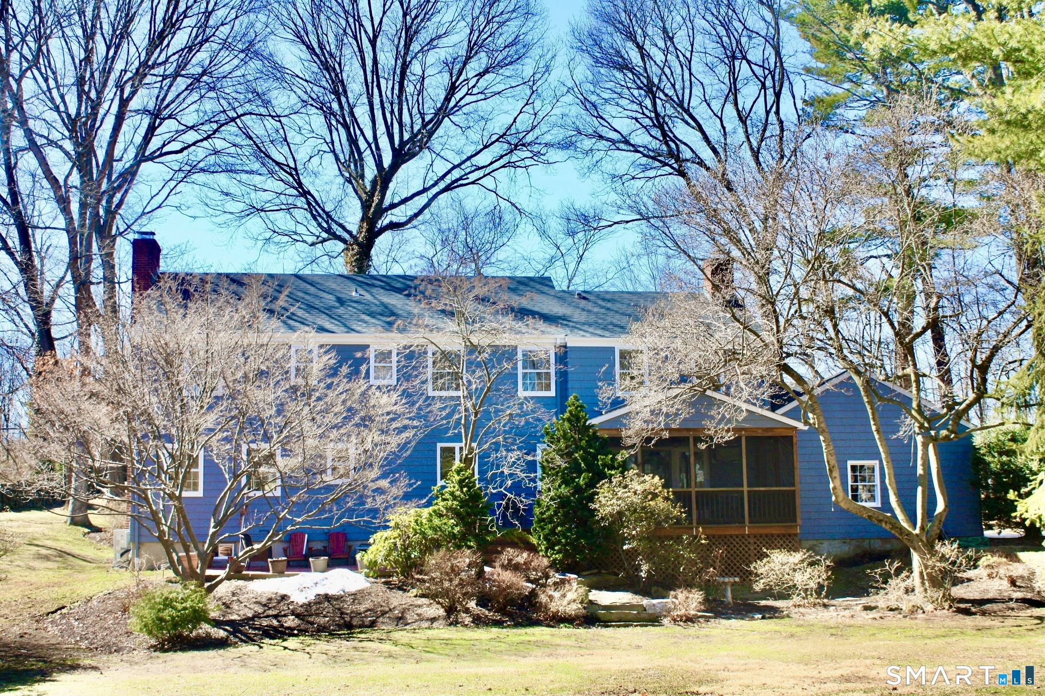 610 Unquowa Road Fairfield, CT 06824 - Photo 3 of 43 a front view of a house with garden