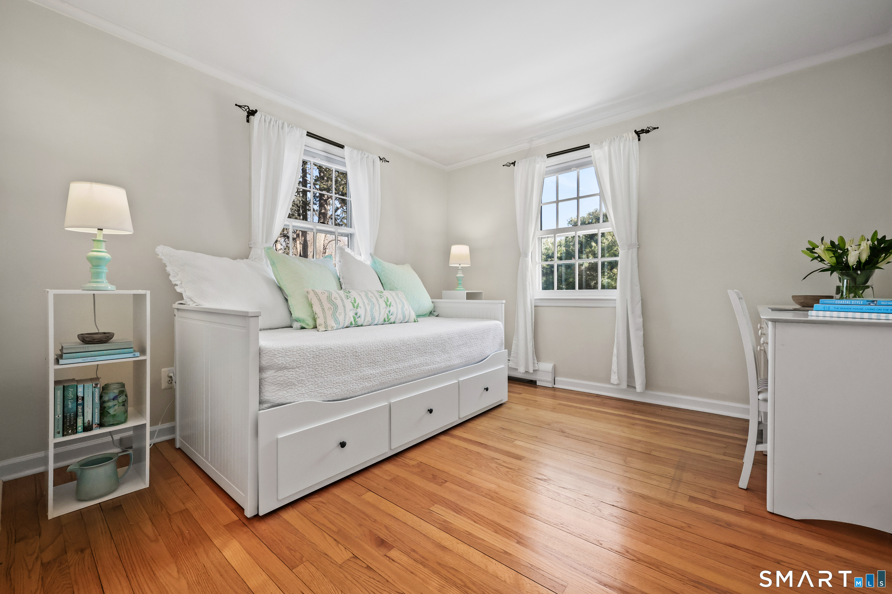 610 Unquowa Road Fairfield, CT 06824 - Photo 40 of 43 a bed room with a bed and a window