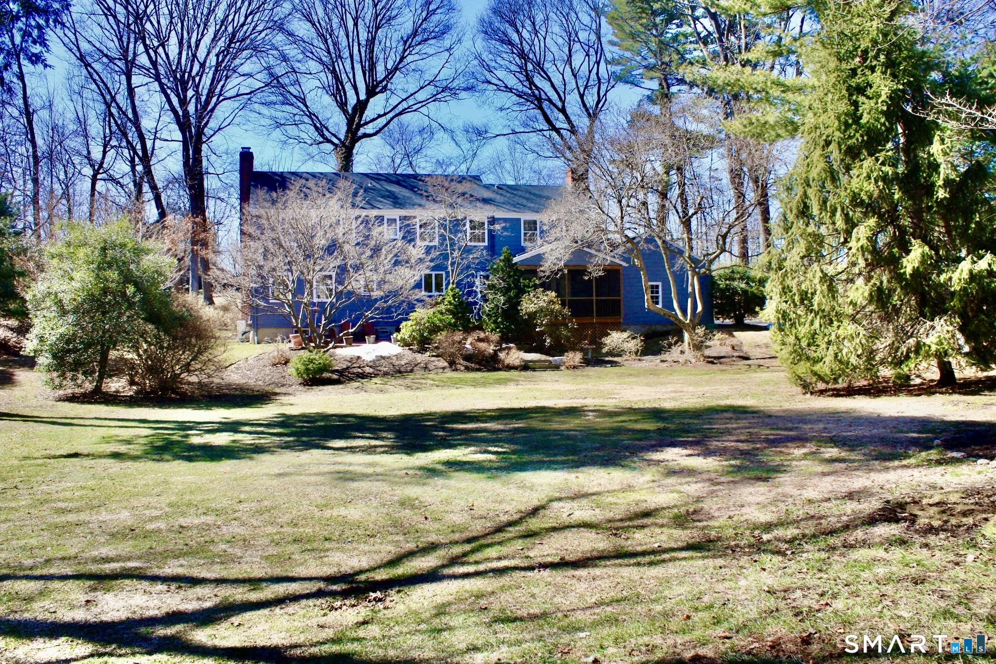 610 Unquowa Road Fairfield, CT 06824 - Photo 5 of 43 a view of a house with a yard
