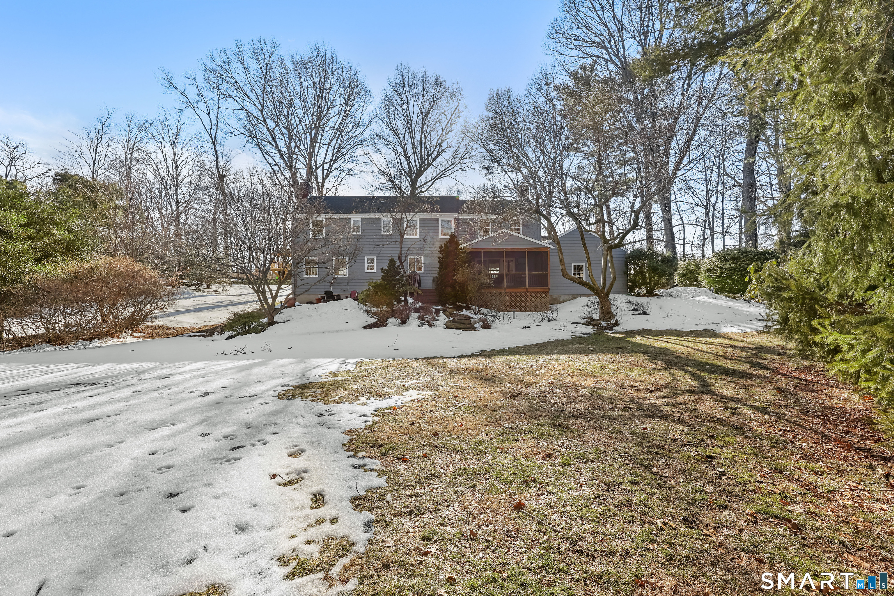 610 Unquowa Road Fairfield, CT 06824 - Photo 6 of 43 a view of a snow on the side of the road