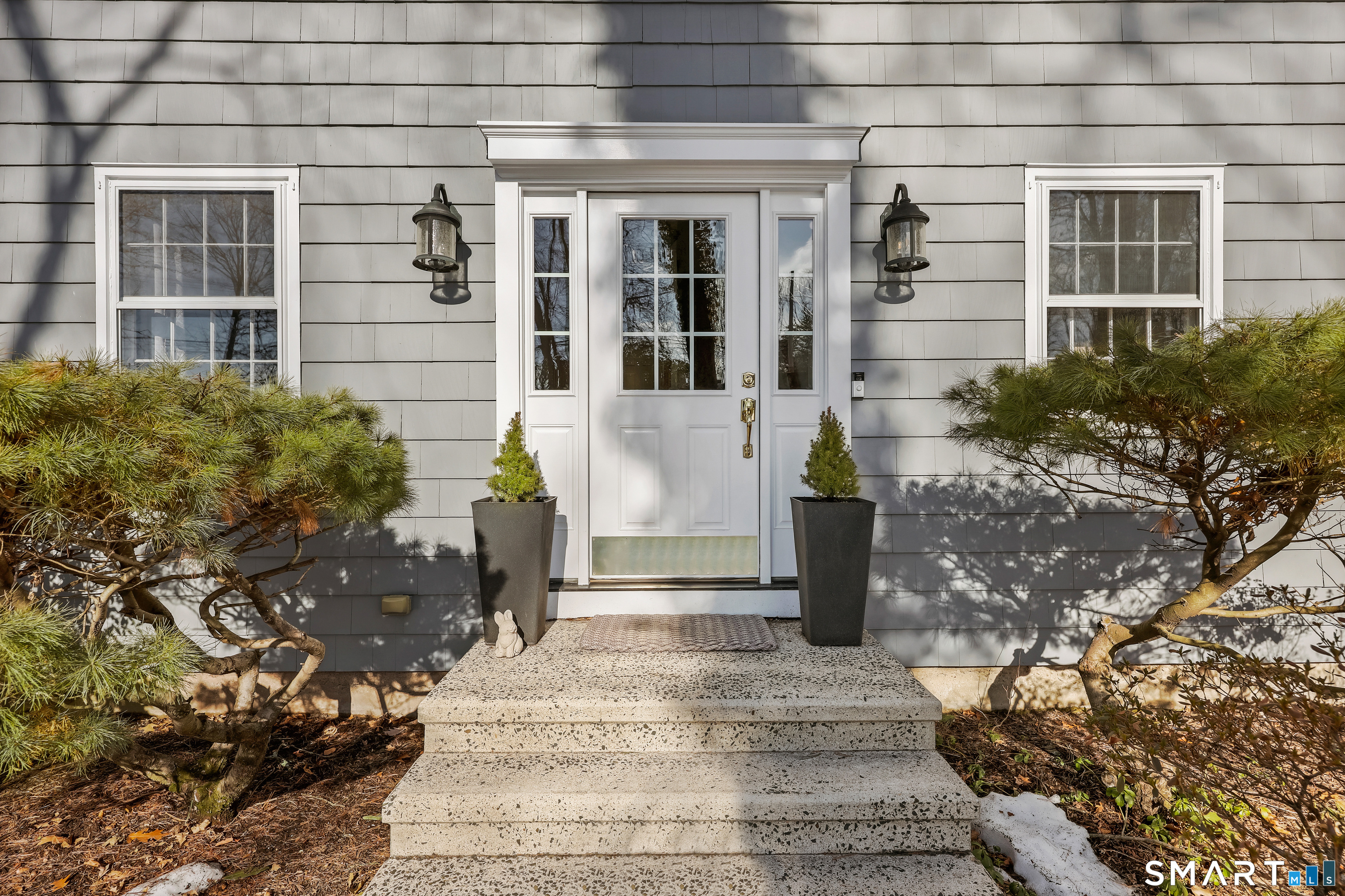 610 Unquowa Road Fairfield, CT 06824 - Photo 9 of 43 a front view of a house