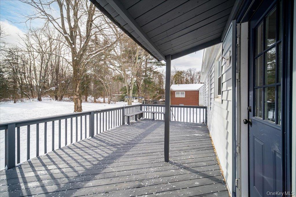 392 Titusville Road Poughkeepsie, NY 12603 - Photo 35 of 43 a view of a wooden deck
