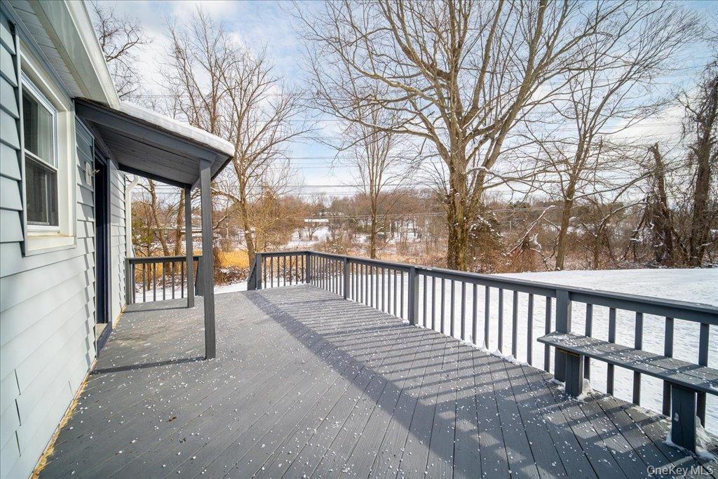 392 Titusville Road Poughkeepsie, NY 12603 - Photo 38 of 43 a view of a two chairs and table in the balcony