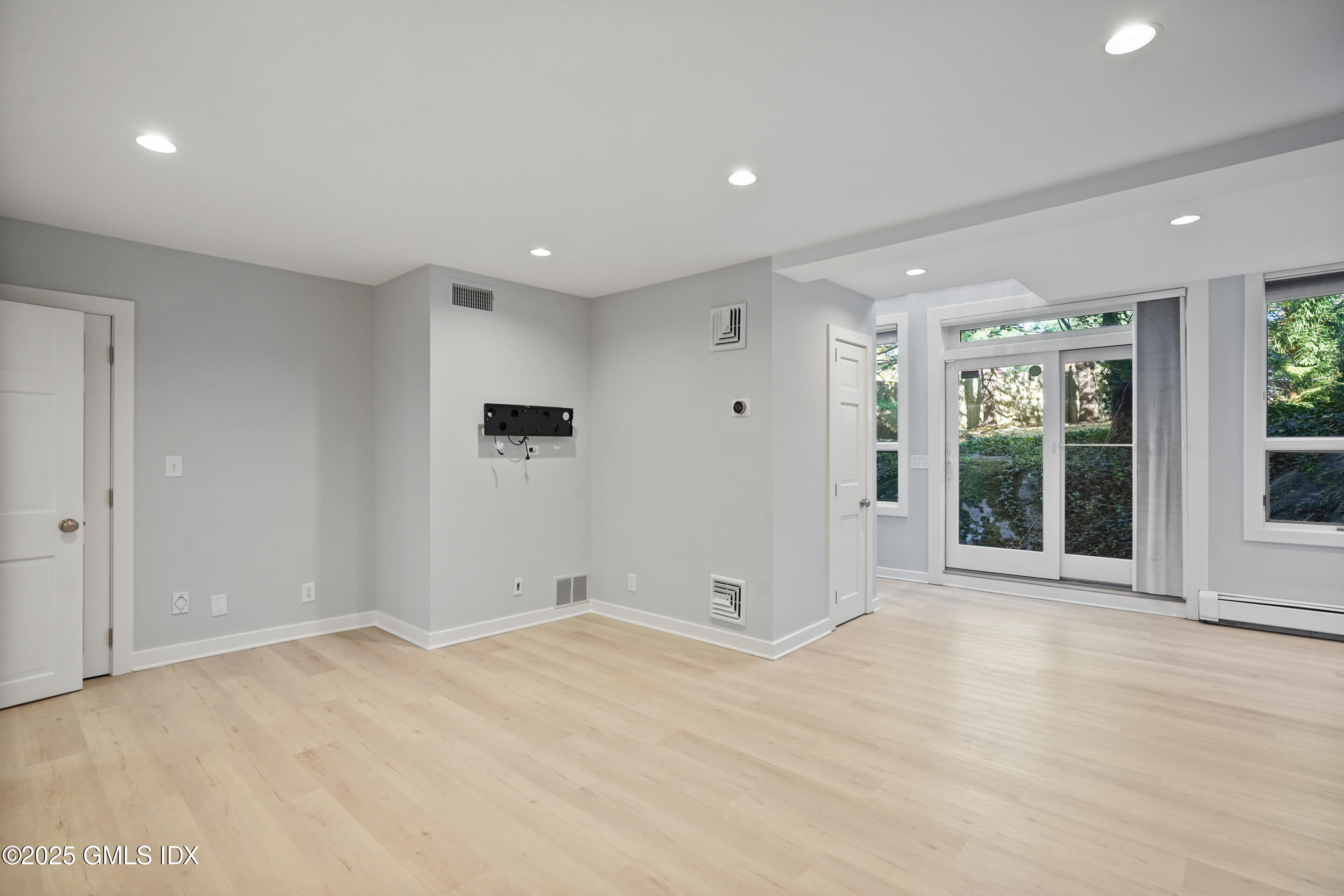 249 Shore Road Greenwich, CT 06830 - Photo 28 of 38 a view of an empty room