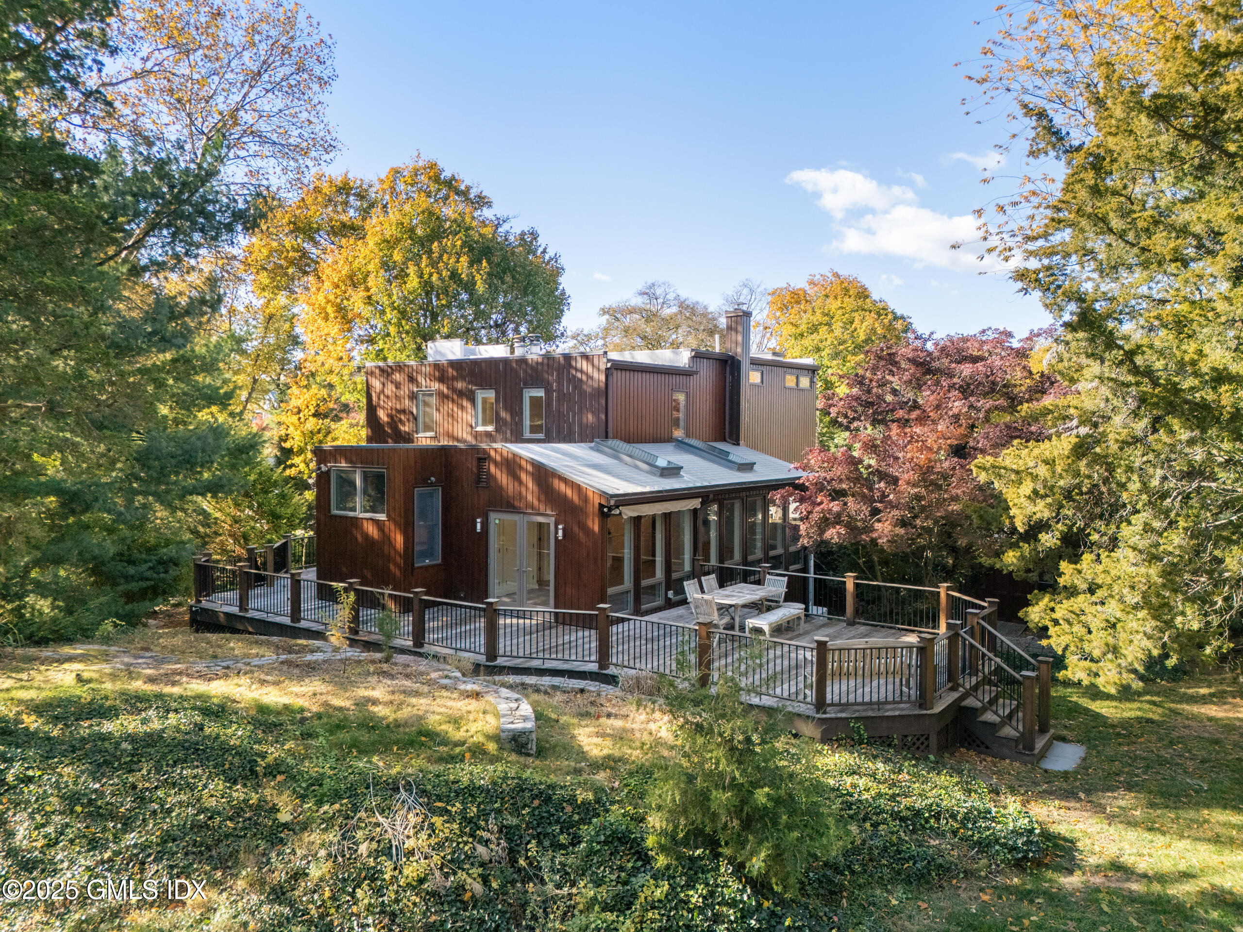 249 Shore Road Greenwich, CT 06830 - Photo 33 of 38 a swimming pool with outdoor seating and yard