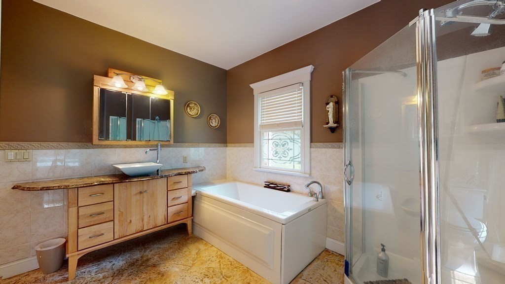 52 Hadley Road Merrimac, MA 01860 - Photo 24 of 40 a bathroom with a sink and a mirror