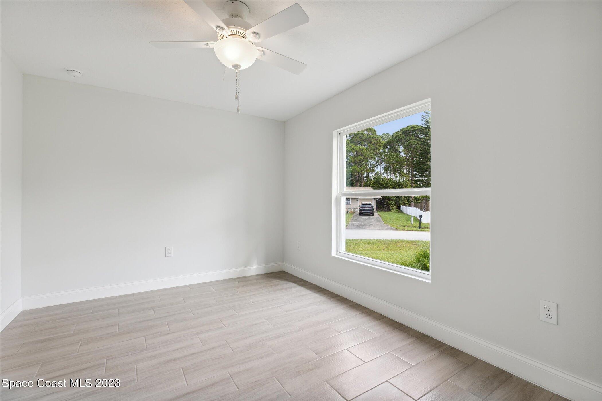 2406 Anchor Road Southeast Palm Bay, FL 32909 - Photo 36 of 37 08-2406-Anchor-Rd-SE-Palm-Bay-FL-32909-W