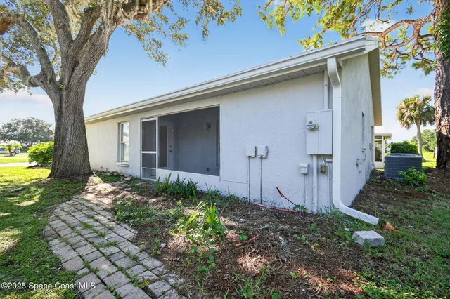 a view of a back yard of the house