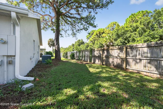 a view of yard with a small pool