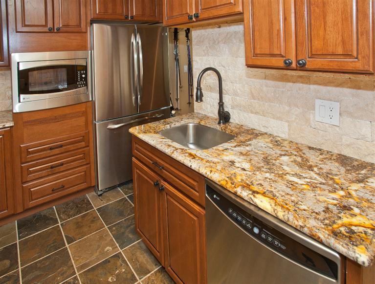 4192 Spruce Way, Unit 204A Vail, CO 81657 - Photo 11 of 21 a kitchen with granite countertop a sink and cabinets