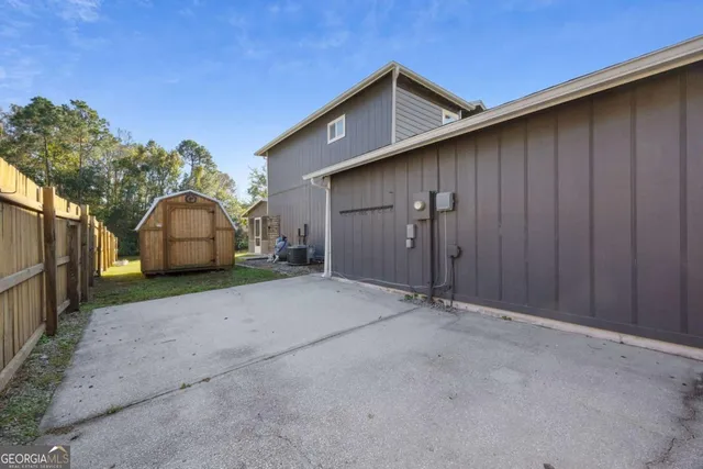 a view of a house with a big yard