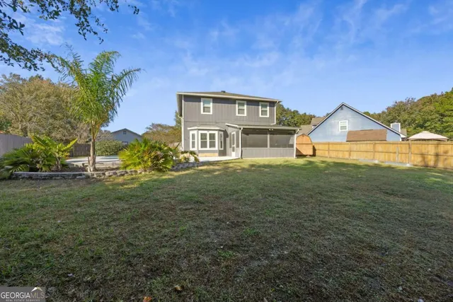 a view of swimming pool with an outdoor space and seating area