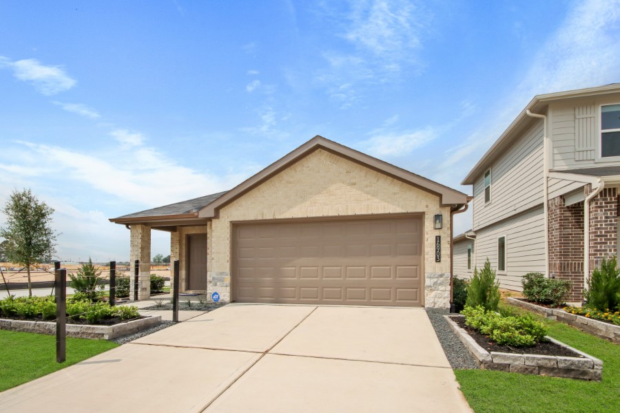 16903 Vinters Way Houston, TX 77090 - Photo 2 of 29 a front view of house with yard