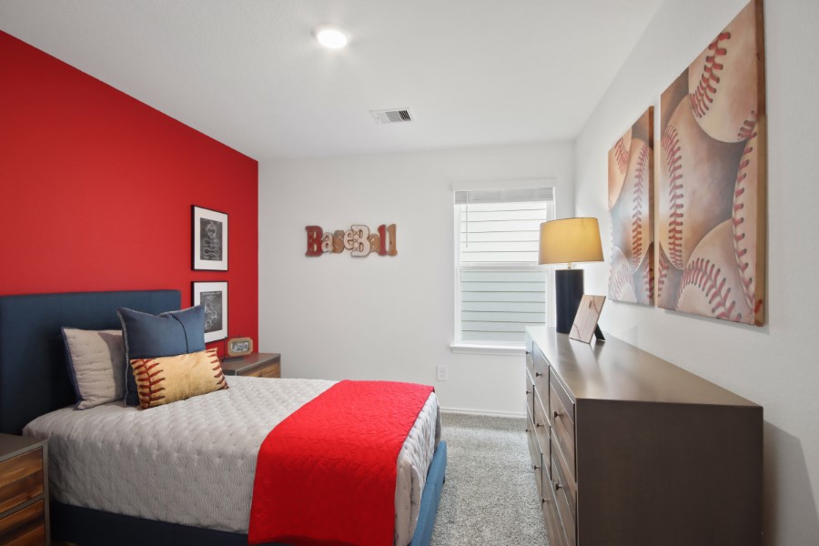 16903 Vinters Way Houston, TX 77090 - Photo 23 of 29 a bedroom with a bed and a lamp