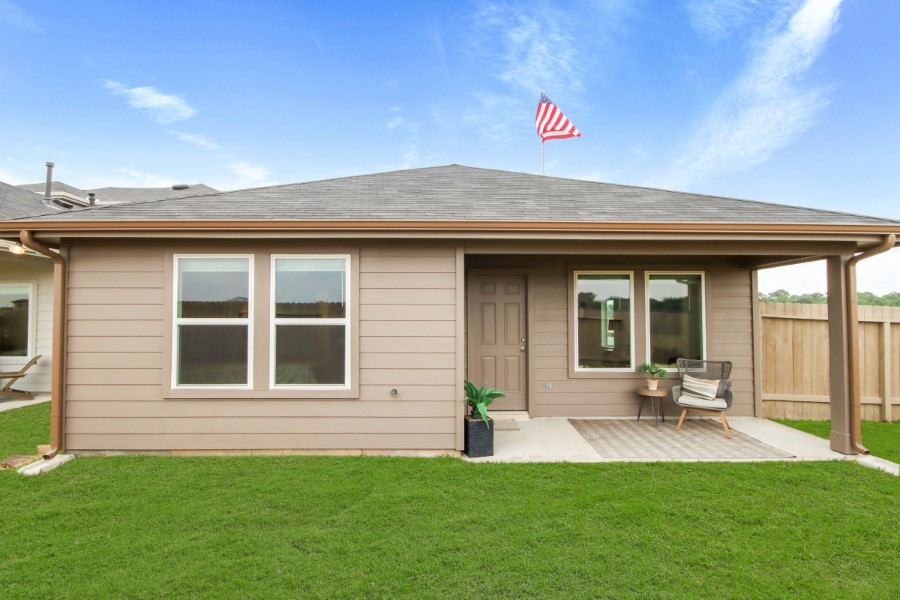 16903 Vinters Way Houston, TX 77090 - Photo 25 of 29 a view of a house with a backyard